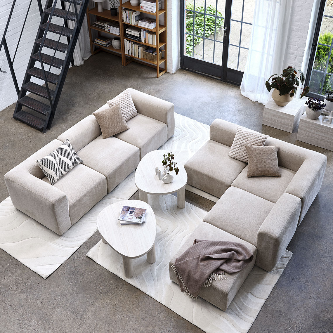 Bež modularna sofa centralised in a large living area